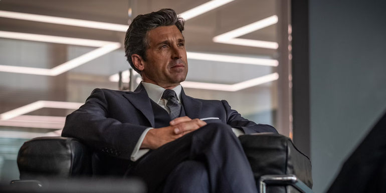 Patrick Dempsey seated in a suit in the series Devils