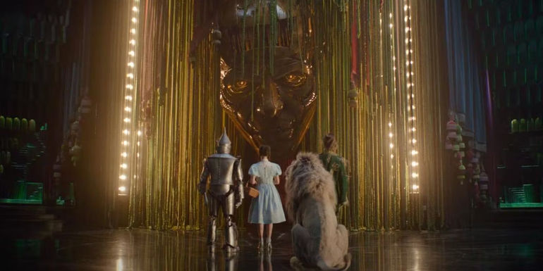 Dorothy and her companions address the Wizard of Oz in the Wicked trailer