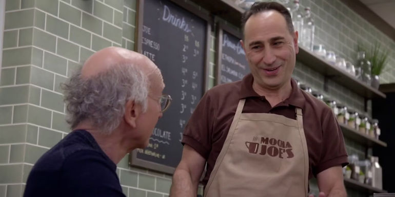 Mocha Joe smiling at Larry in Curb Your Enthusiasm