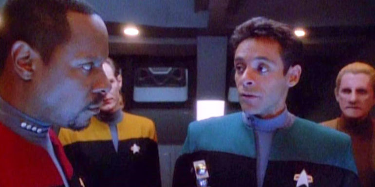 Captain Sisko and Dr. Bashir discuss events in the sickbay