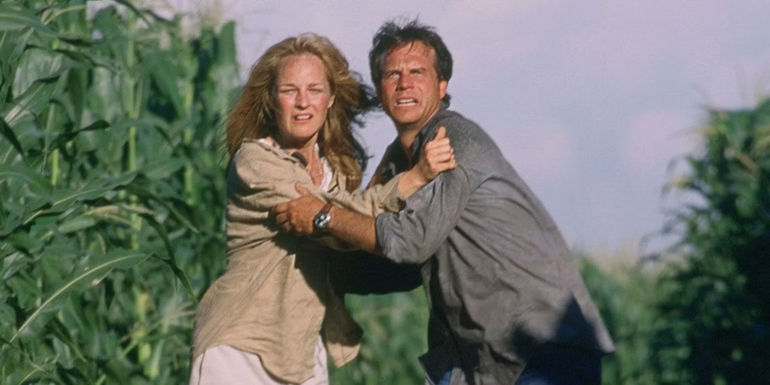 Helen Hunt and Bill Paxton's Jo and Bill Harding grab each other in a cornfield and stare at a tornado