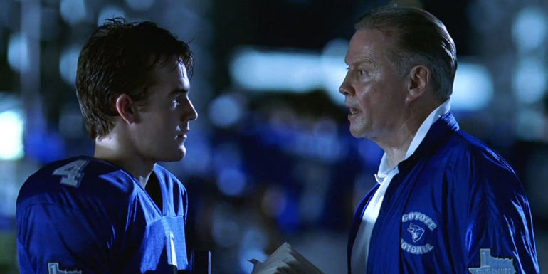 Coach Kilmer (Jon Voight) talking sternly to Mox (James Van Der Beek) in Varsity Blues.