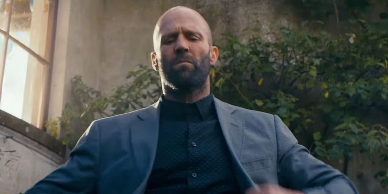 Jason Statham looking down in The Beekeeper