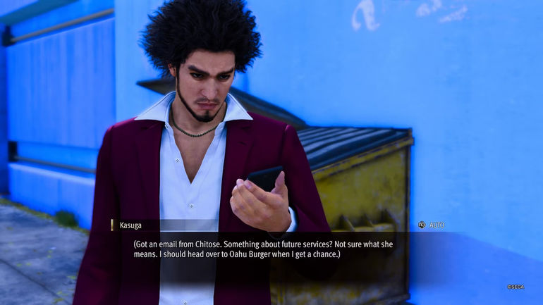Kasuga receives a text message from Chitose Buster Holmes in Like a Dragon: Infinite Wealth