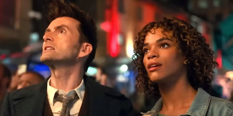 Rose Noble and The Fourteenth Doctor look up and off to the side in Doctor Who.