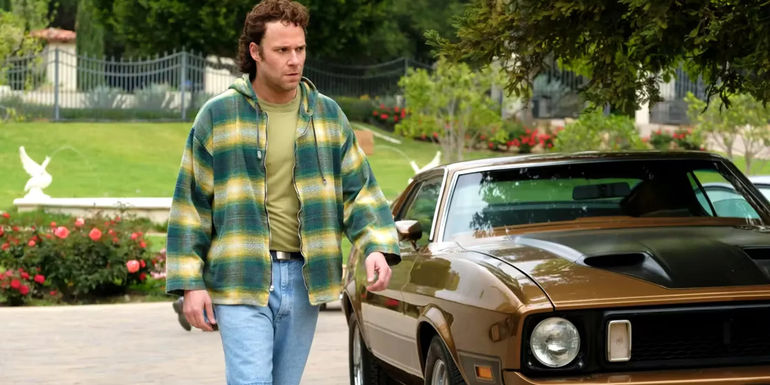 Rand (Seth Rogen) Gauthier coming out of a car looking pensive in Pam & Tommy