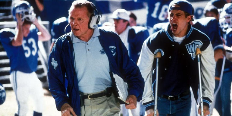Jon Voight as the coach yelling next to Paul Walker's Lance on crutches in Varsity Blues