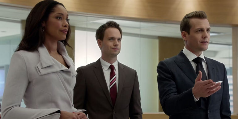 Jessica, Mike and Harvey standing together in an office in Suits