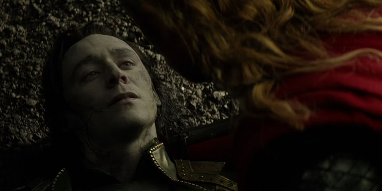 Tom Hiddleston as Loki faking his own death as Thor (Chris Hemsworth) mourns him in Thor The Dark World
