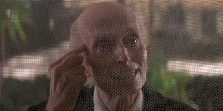 Julien Beck as evil ghost Henry Kane in Poltergeist II