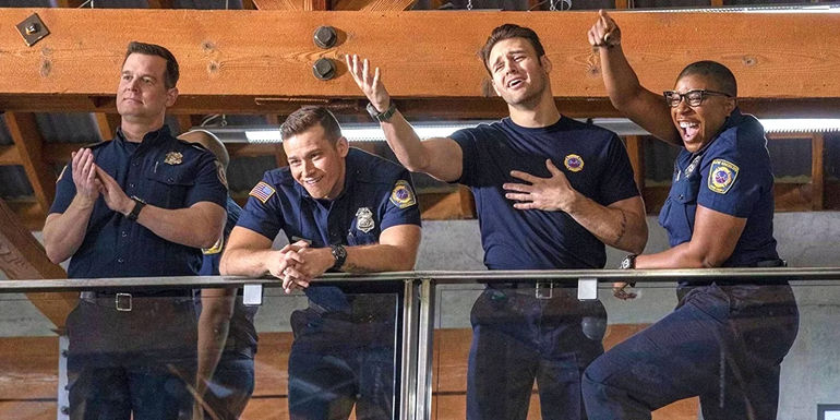 Four firefighters joking around on 9-1-1