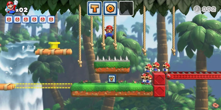 mario completing a mario vs donkey kong level