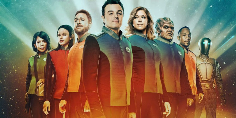 The crew of the Orville, led by Seth MacFarlane, stand proudly in a V-formation.
