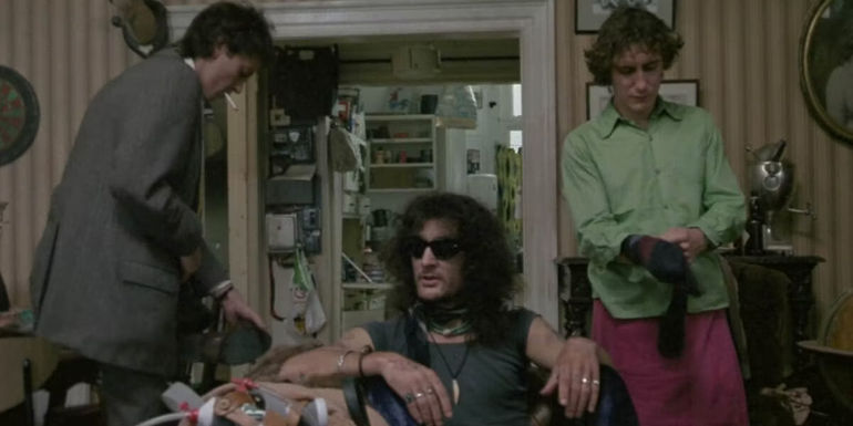 Withnail, Danny, and "I" in an apartment. 