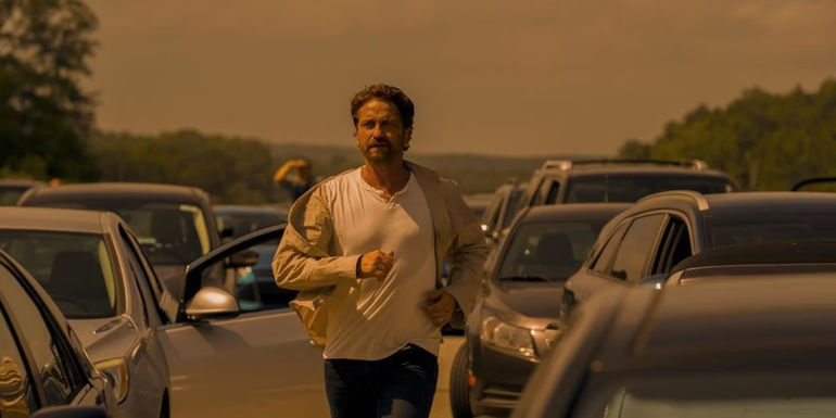 Gerard Butler runs in Greenland