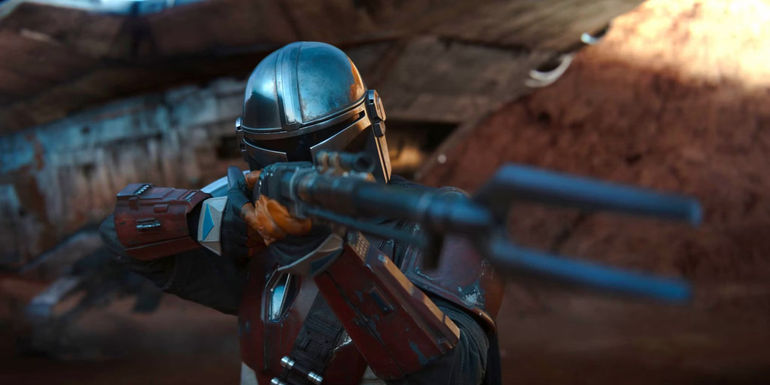 Din Djarin wields his Amban phase-pulse blaster rifle, or pulse rifle, in The Mandalorian season 1