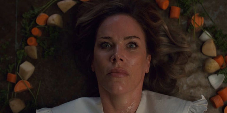 Kathleen laid out with vegetables in Thanksgiving