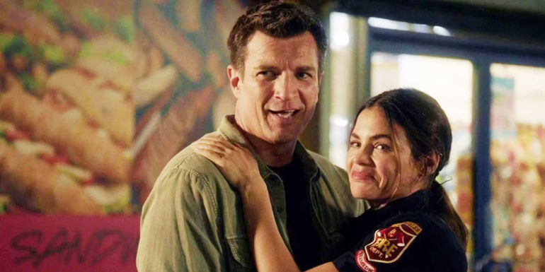 Nolan (Nathan Fillion) and Bailey (Jenna Dewan) embrace in The Rookie.