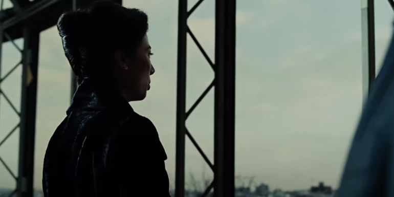 Ms. Yutani in AVPR standing by a window