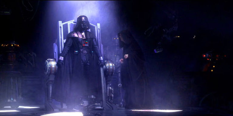 Darth Vader strapped to the machine that created his mechanical parts as Palpatine watches.