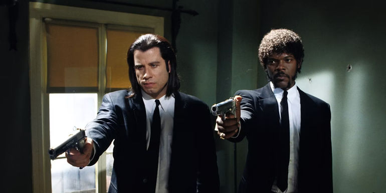 John Travolta and Samuel L Jackson pointing guns in Pulp Fiction