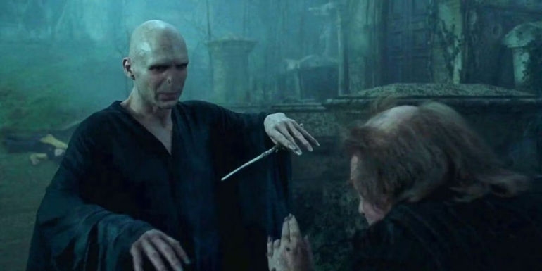Voldemort and Wormtail standing in the graveyard in Harry Potter and the Goblet of Fire