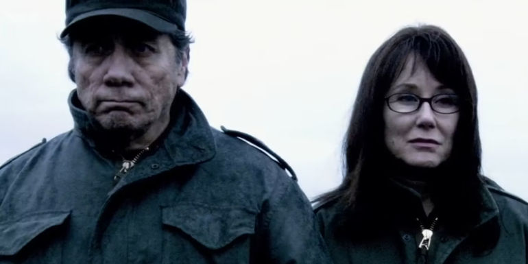 Adama and Roslin look at the irradiated Earth in Battlestar Galactica