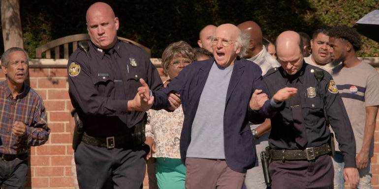 Larry is arrested by two cops in Curb Your Enthusiasm