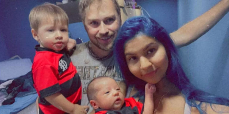 Paul and Karine Staehle from 90 Day Fiancé taking a selfie with their kids Pierre and Ethan