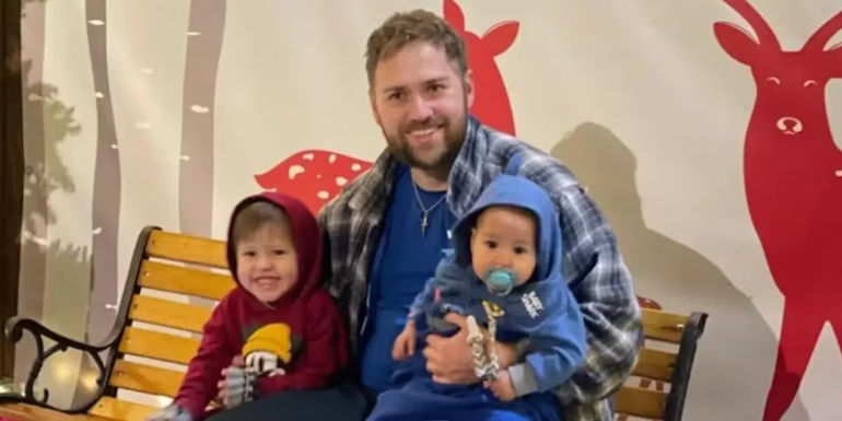 paul staehle with kids smilng on bench 90 day fiance