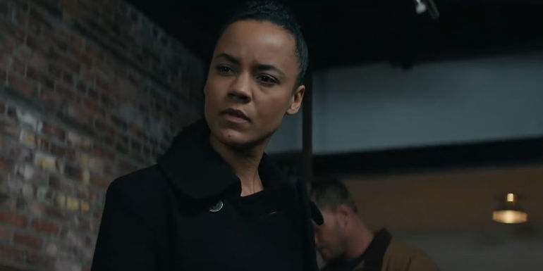 Reacher and Neagley investigate the apartment in season 2 of Reacher