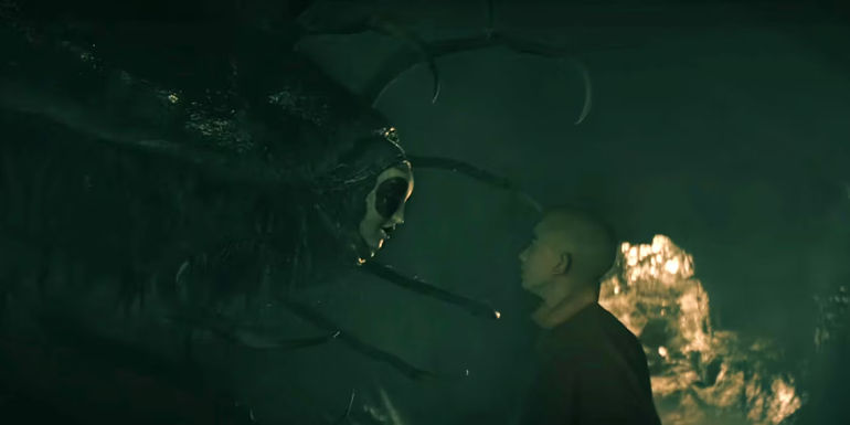 Koh The Face Stealer looking at Aang in a cave in Netflix's The Last Airbender