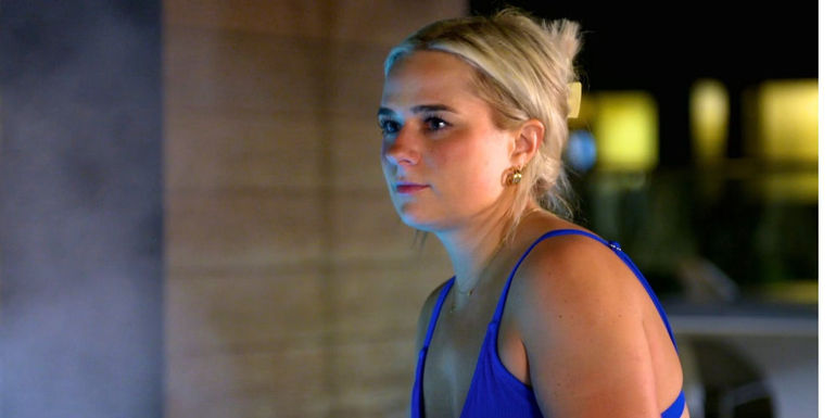 Emily from Married At first Sight season 17 wearing a blue bikini top looking upset - Emily Snapped At Afterparty Host Keshia Knight Pulliam