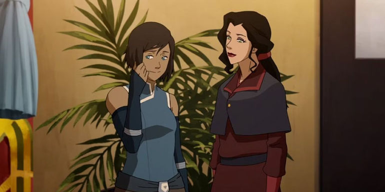 Korra pulls at her hair while blushing as she talks to Asami in The Legend of Korra - Streaming On Netflix & Paramount+ - The Legend Of Korra (2012-2014)