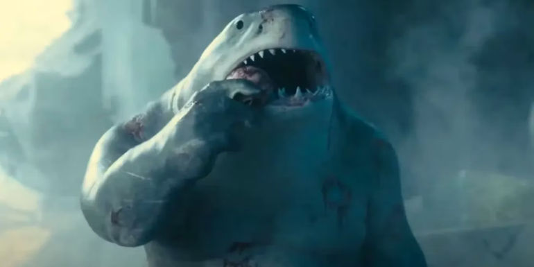 King Shark eating someone in The Suicide Squad. - The Suicide Squad (2021) - King Shark Was One Of The Suicide Squad’s Breakout Stars