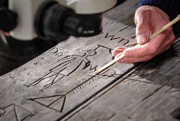 Historic Castle Unveils Soldier Graffiti in Startling Revelation