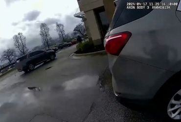 Michigan state trooper charged with murder for fatally hitting fleeing suspect with SUV