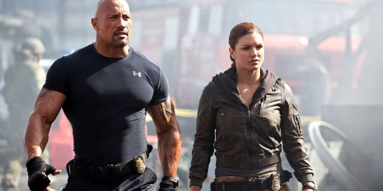 The Rock and Carla Gugino walking in Fast and Furious 6