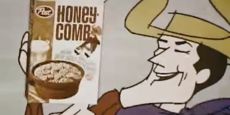 The Honeycomb Kid riding and holding up a box of Honeycomb cereal.