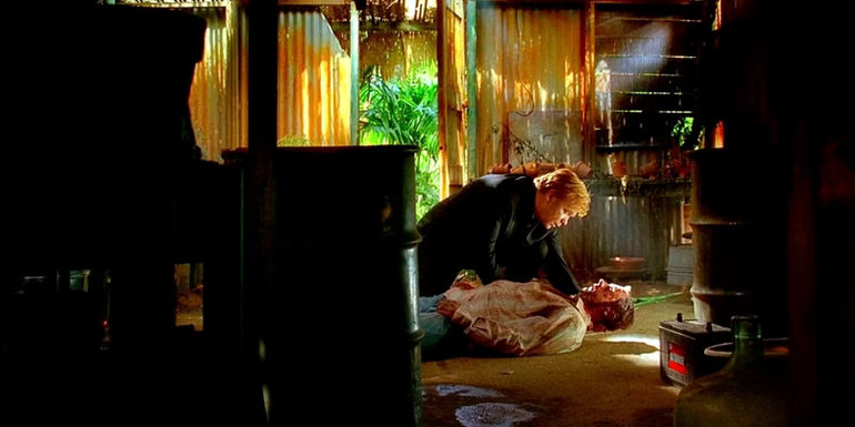 David Caruso as Horatio Caine and Dean Winters as Raymond Caine in CSI: Miami.
