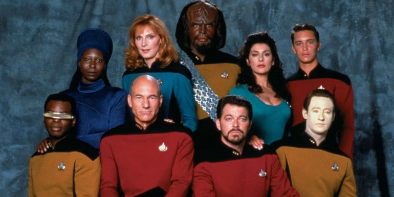 The cast of Star Trek The Next Generation pose for a promotional image