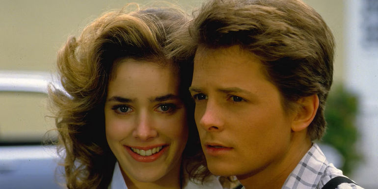 Claudia Wells and Michael J. Fox posing together in Back to The Future