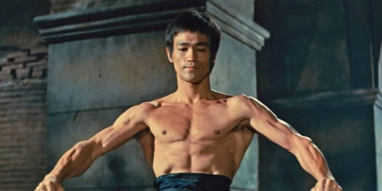Bruce Lee posing in The Way of the Dragon