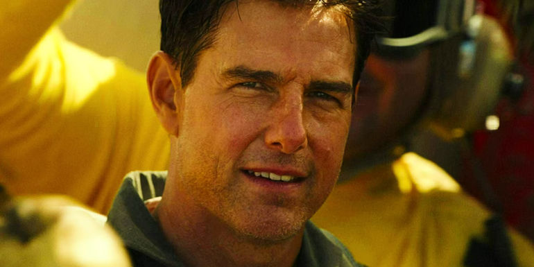 Close up of Tom Cruise's Maverick smiling slightly at the end of Top Gun Maverick