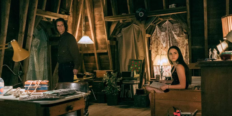 Victor and Julie in a small room in From.