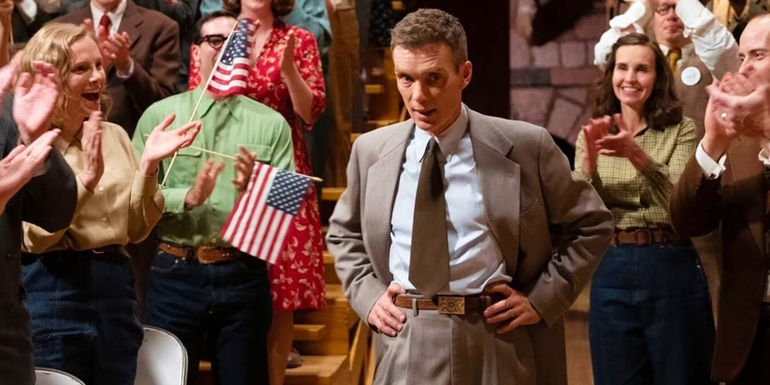 Oppenheimer being applauded in Oppenheimer