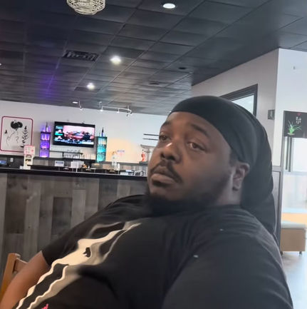 tony rodgers via youtube posing in black shirt in profile