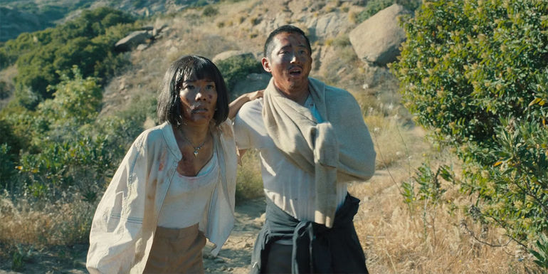 Amy (Ali Wong) and Danny (Steven Yeun) walking through the desert in Beef episode 10