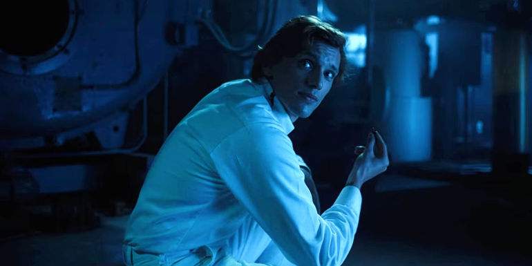 One/Henry Creel (Jamie Campbell Bower) holding the Soteria device in Stranger Things season 4.