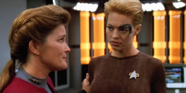 In Voyager's sickbay, Janeway regards Seven of Nine with a kind look.